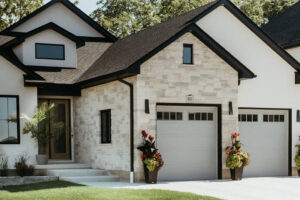 Exterior of home front entry way and driveway.